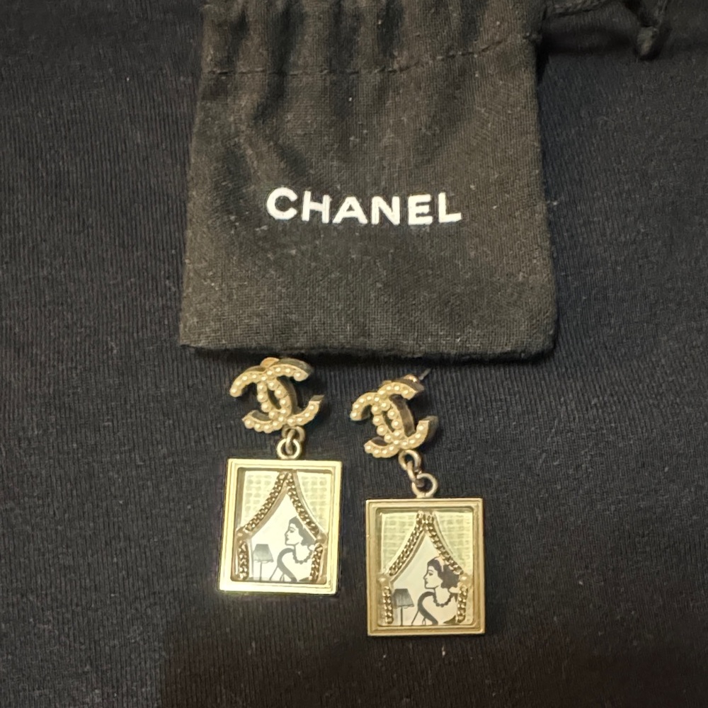 CHANEL Gold Logo Earrings with Artistic Design